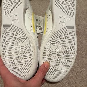 White with yellow lo top adidas size 8 women’s shoes